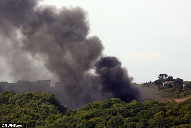 Anti-badger cull group claim they torched £16m police firing range which burned to the ground