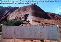 Local people's sign requesting people not to climb Uluru in several languages. 