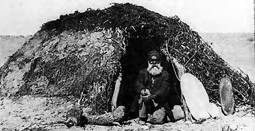 Dome-shaped Aboriginal building.