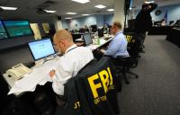 FBI-Mitarbeiter (Archivbild aus dem Jahr 2010): Razzia wegen Cyberangriff gegen Firmen