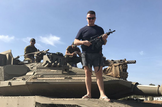 Gun-toting British anti-Muslim activist poses on Israeli tank