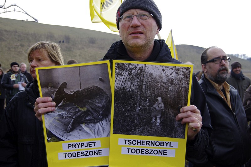 Man with 2 placards