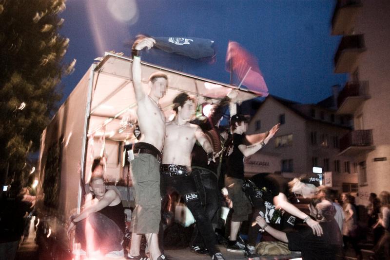 Dancing on a sound truck.