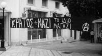Banner in Arta, Greece: “State + Nazis = same business”