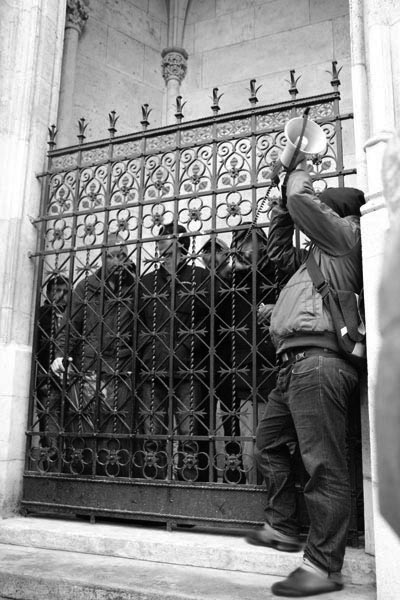 refugees hold a speech to the protesters