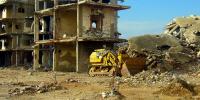 Zerstörte Häuser in der 'E-Prime' Nahr al-Bareds