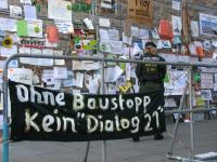 Ohne Baustopp, kein Dialog 21