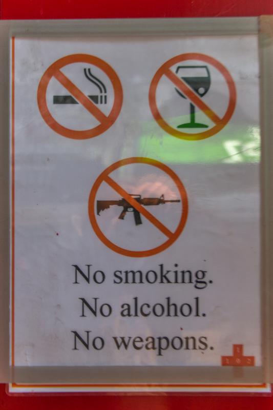 Sign: No smoking. No alcohol. No Weapons.