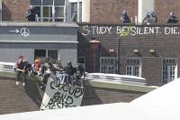 Riot police stand by as the students stage their protest at St Michael's College in Sydney